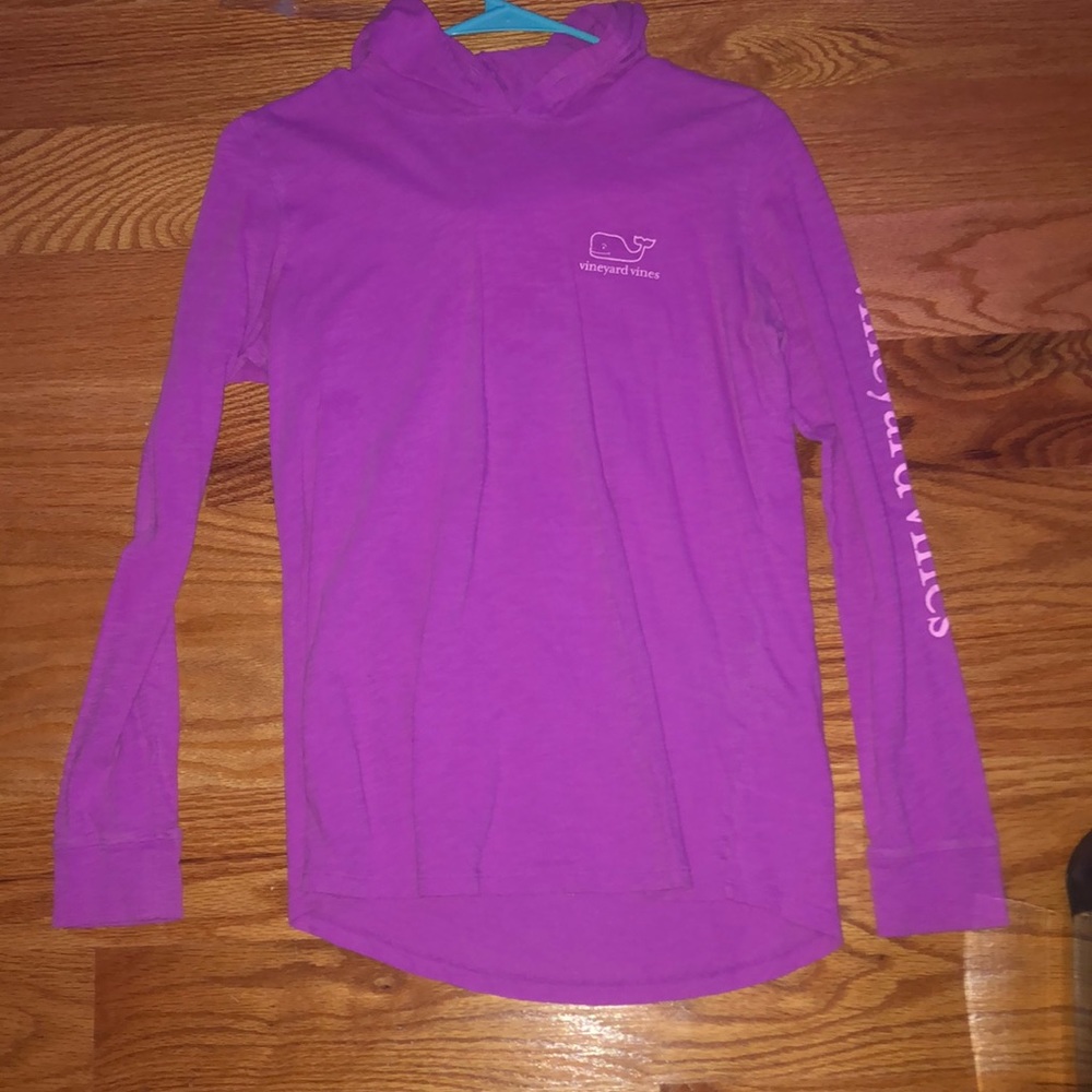 A light washed pink vineyard vines hoodie